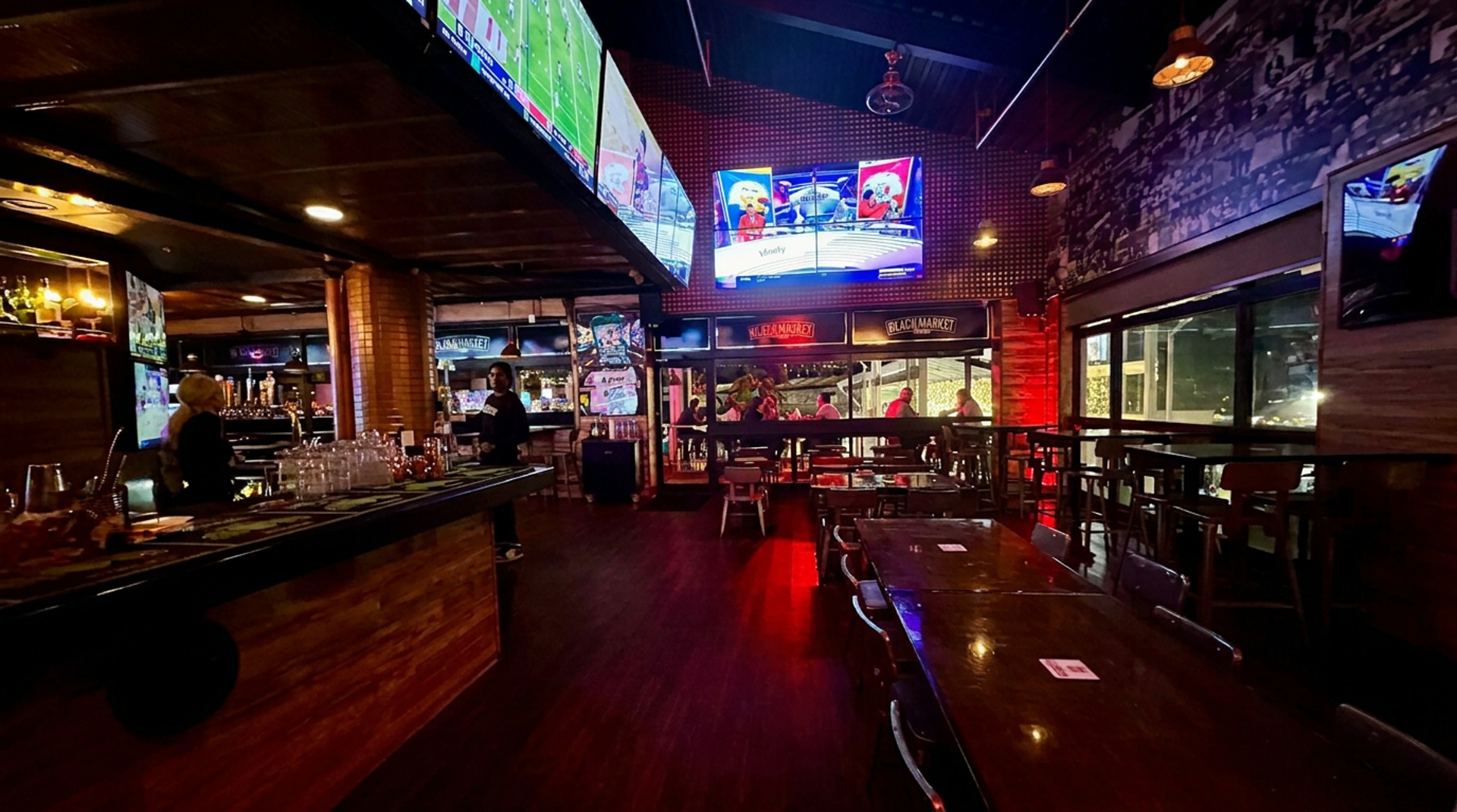 Screens on all four walls